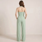 Grøn Dame Jumpsuit med Halterneck, Flettede Detaljer og Vide Ben