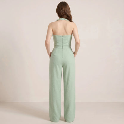 Tuta jumpsuit verde da donna con scollo halter e pantaloni larghi